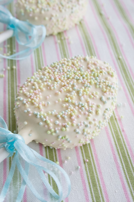 Easter egg cake pops coated with chocolate and sugar sprinkles